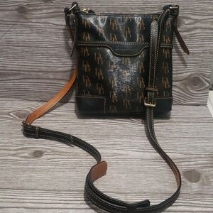 Dooney and Burke 1975 black canvas tan monogram crossbody bag
